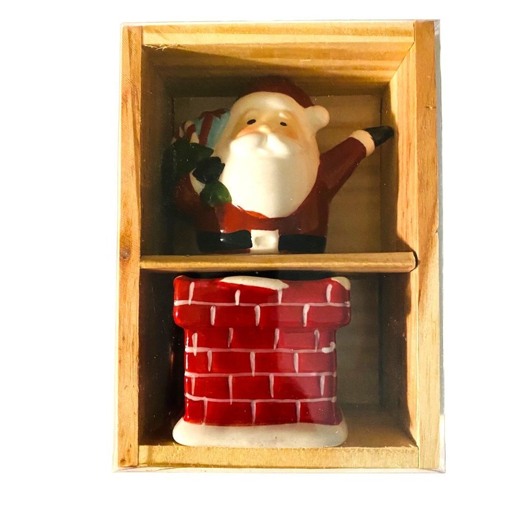 World Market Santa Claus Coming Down The Chimney Salt and Pepper Shakers 2 Inch